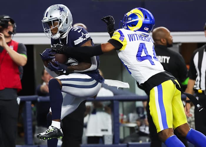 Dallas Cowboys wide receiver Brandin Cooks (3) makes a touchdown catch past Los Angeles Rams cornerback Ahkello Witherspoon (44) during the fourth quarter at AT&T Stadium.